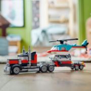 Obrázek Náklaďák s plochou korbou a helikoptéra